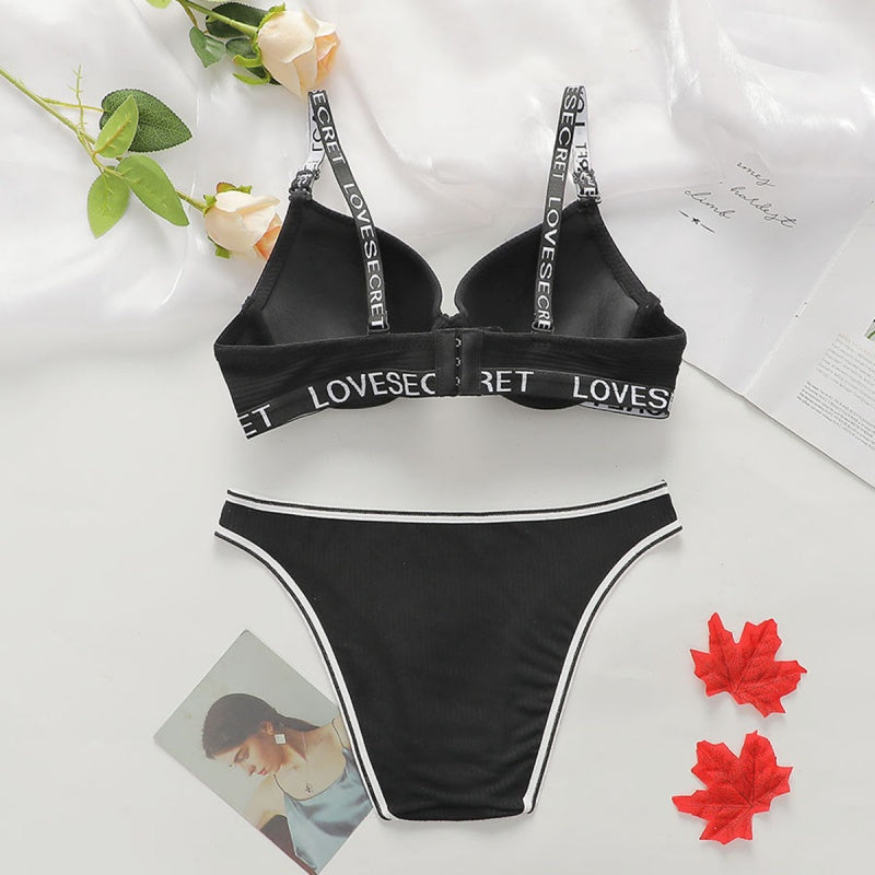 Sexy Lingerie Set, Featuring A Backless, Push-up, And Supportive Bra With Lettered Shoulder Straps.
